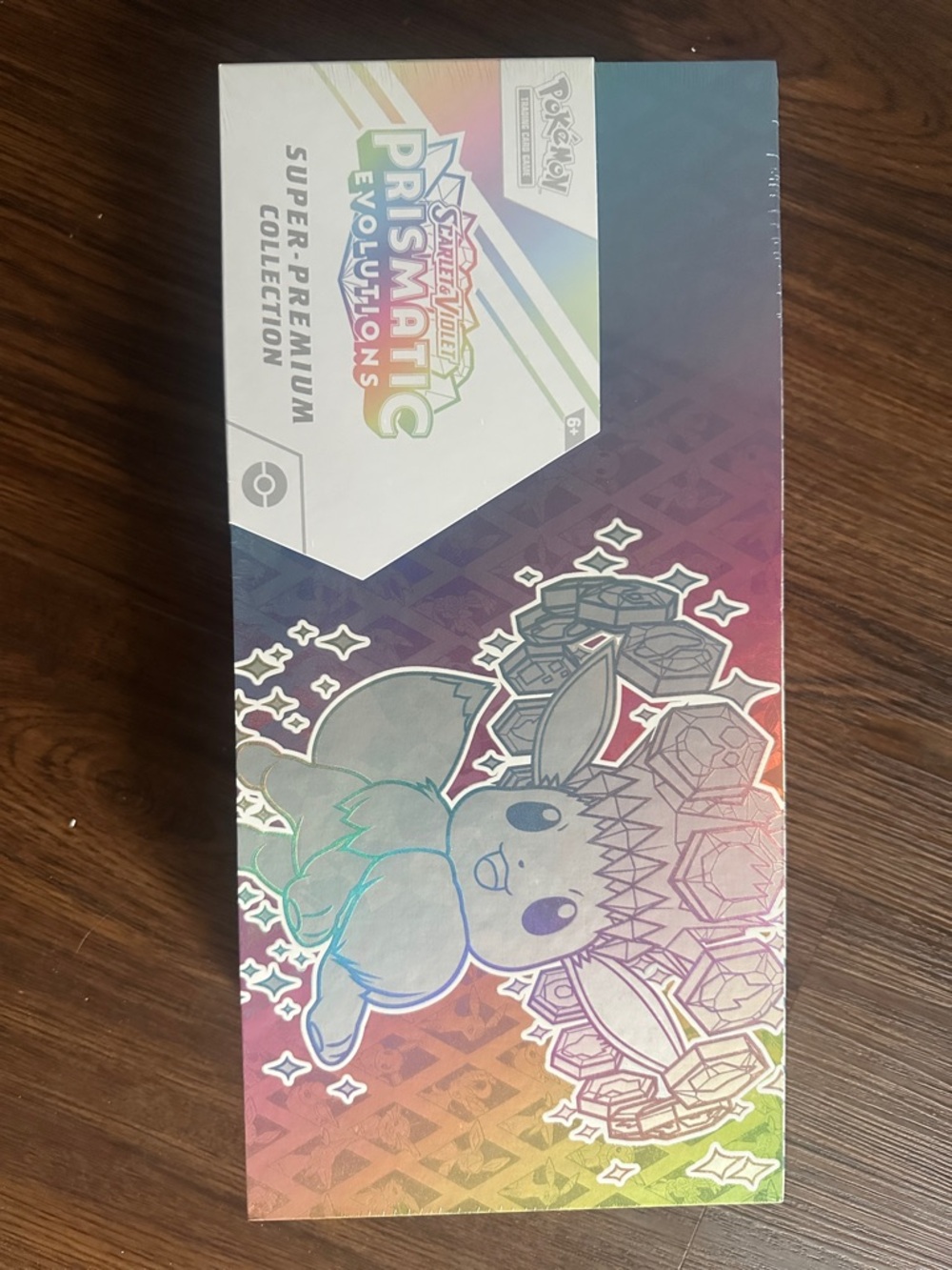 Pokemon Prismatic Evolutions Super-Premium Collection Rainbow Box with Eevee Art